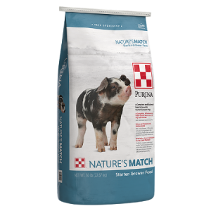 Blue and white 50-lb feed bag. Purina Nature's Match Starter-Grower Pig Feed