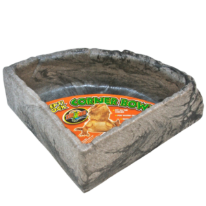 A Zoo Med Repti Rock Corner Bowl - surface is rocky and gray, shaped like a triangle